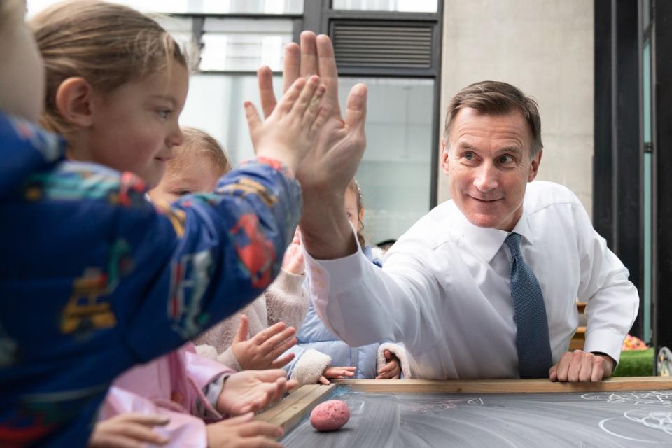 Chancellor Jeremy Hunt last year announced that eligible families of children as young as nine months old in England would be able to claim 30 hours of free childcare a week by September 2025 (Getty Images)
