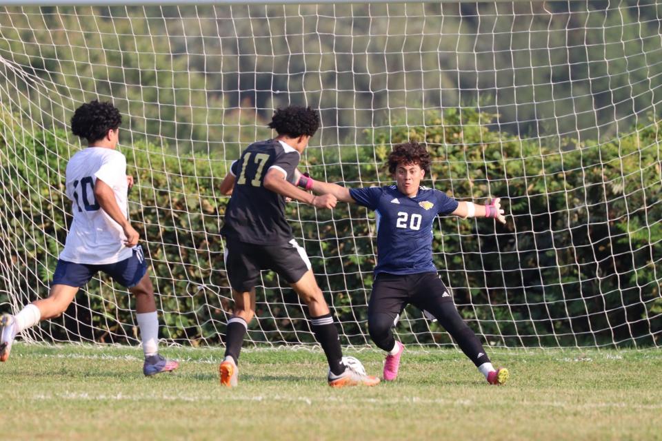 Davies' Allesandro Sanchez (17) closes in on Blackstone Valley Prep keeper Anthony Benitez is the season opener for both teams on Wednesday.