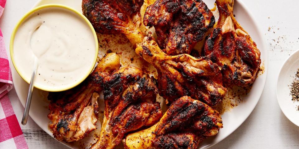 butterflied chicken drumsticks seasoned with brown sugar, smoked paprika, chili powder, garlic powder, and dried thyme and grilled until tender and charred then served with alabama white sauce