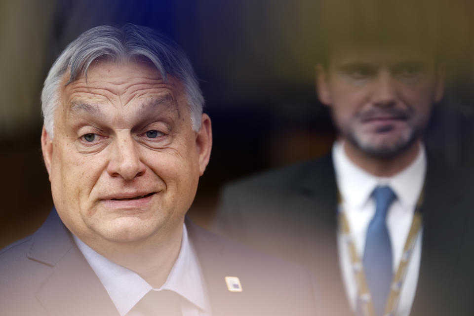 FILE - Hungary's Prime Minister Viktor Orban, left, arrives for an EU summit in Brussels, June 27, 2024. Orban has arrived in Moscow for talks with Russian President Vladimir Putin, Orbán’s press chief said Friday, July 5, a rare visit to Russia by a European leader since it invaded Ukraine more than two years ago. (AP Photo/Geert Vanden Wijngaert, File)