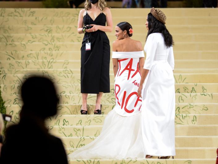 Ocasio-Cortez wearing a dress emblazoned with “Tax the Rich” at the 2021 Met Gala in New York City on September 13, 2021.