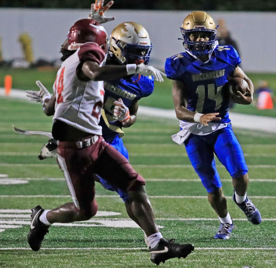 Mainland's DJ Murray (14) and his backfield mate, Khamani Robinson, each rank among the area's rushing leaders.