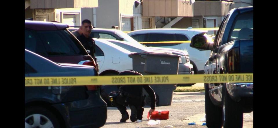 Officers investigate a shooting that left two men injured in Fresno, California on Tuesday, April 30, 2024.