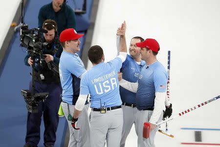 Curling - Pyeongchang 2018 Winter Olympics - Men's Semi-final - Canada v U.S. - Gangneung Curling Center - Gangneung, South Korea - February 22, 2018 - Team U.S. celebrate after winning the game. REUTERS/Cathal McNaughton