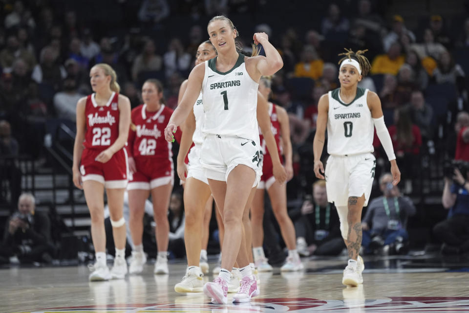 Michigan State guard Tory Ozment (1) walks down the court during the first half of an NCAA college basketball quarterfinal game against Nebraska at the Big Ten women's tournament Friday, March 8, 2024, in Minneapolis. (AP Photo/Abbie Parr)