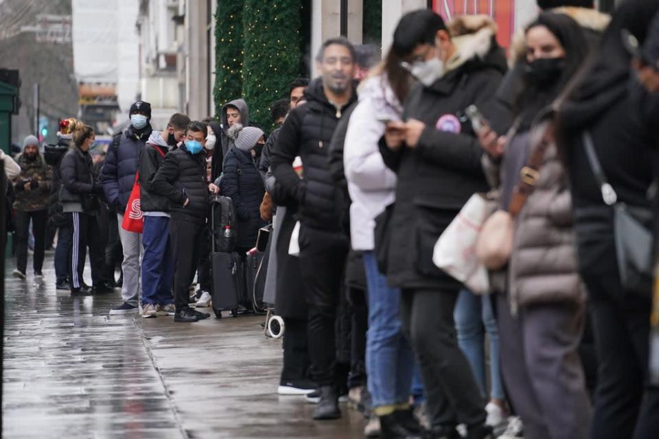 Shoppers stand in line for the doors to open for the start of the Boxing Day sales at Selfridges department store on Oxford Street in London (Jonathan Brady/PA) (PA Wire)