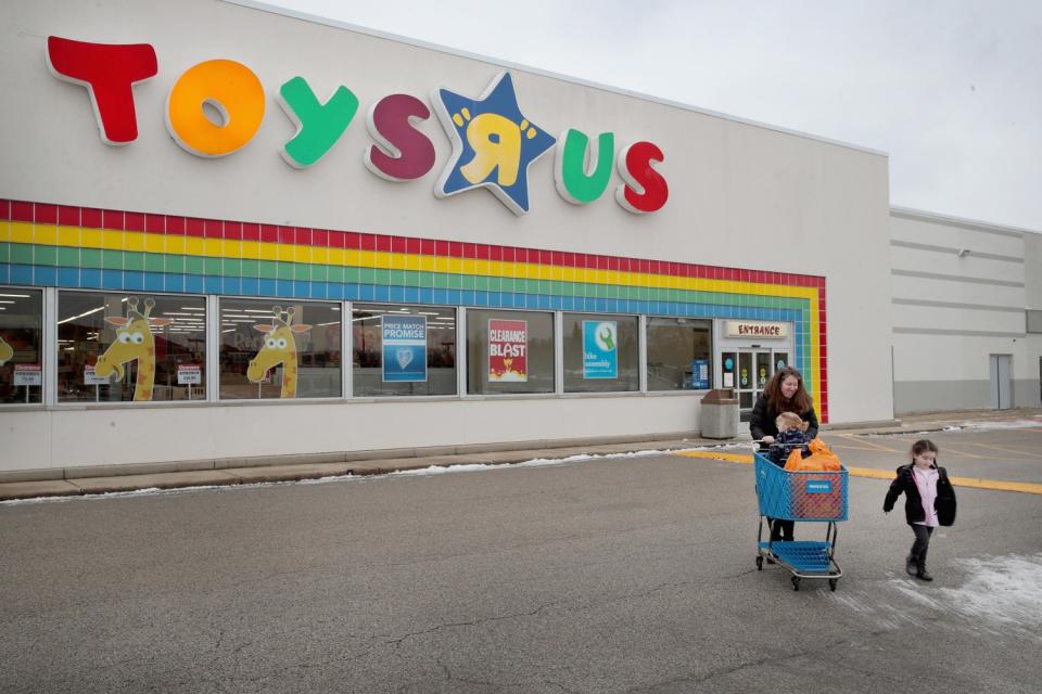 Customers shop at a Toys R Us store on Jan. 24, 2018, in Highland Park, Ill.