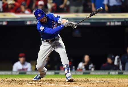 Nov 2, 2016; Cleveland, OH, USA; Chicago Cubs third baseman Kris Bryant hits a single against the Cleveland Indians in the fourth inning in game seven of the 2016 World Series at Progressive Field. Mandatory Credit: Tommy Gilligan-USA TODAY Sports - RTX2RMJF