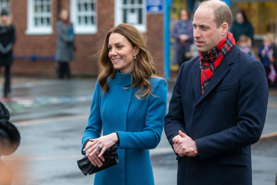 Britain's Prince William, Duke of Cambridge (R) and Britain's Catherine, Duchess of Cambridge (L) meet schoolchildren and teachers at Holy Trinity Church of England First School in Berwick-Upon-Tweed, north-east England on December 7, 2020, on their first full day of engagements on their tour of the UK. - During their trip, their Royal Highnesses hope to pay tribute to individuals, organisations and initiatives across the country that have gone above and beyond to support their local communities this year. (Photo by Andy Commins / POOL / AFP) (Photo by ANDY COMMINS/POOL/AFP via Getty Images)