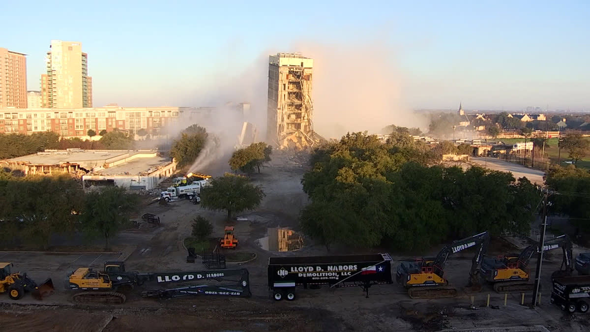 The middle core of the former Affiliated Computer Services tower remained standing with a bit of a lean Sunday night, Feb. 16, 2020, after an implosion didn't go as planned that morning.