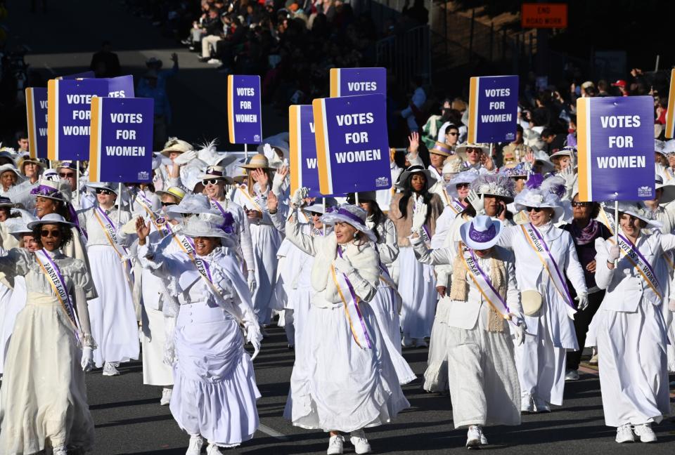 women dress like suffragettes, rose bowl 2020, suffragette white clothing outfit