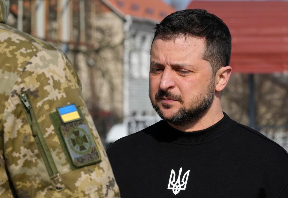 Ukrainian President Volodymyr Zelenskyy presents a medal to a serviceman in Trostianets in the Sumy region of Ukraine (Copyright 2023 The Associated Press. All rights reserved)