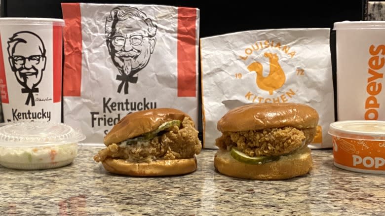 KFC and Popeye's combo meals displayed