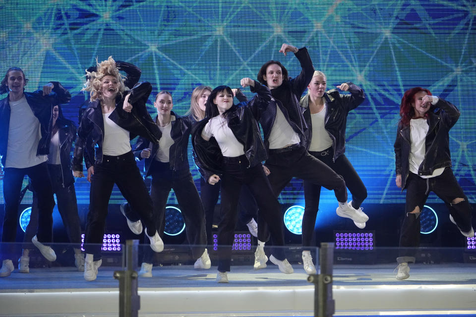 Dancers perform during a concert marking the 10-year anniversary of Crimea's annexation by Russia on Red Square in Moscow, Russia, Monday, March 18, 2024. President Vladimir Putin seized Crimea from Ukraine a decade ago, a move that sent his popularity soaring but was widely denounced as illegal. (AP Photo/Alexander Zemlianichenko)