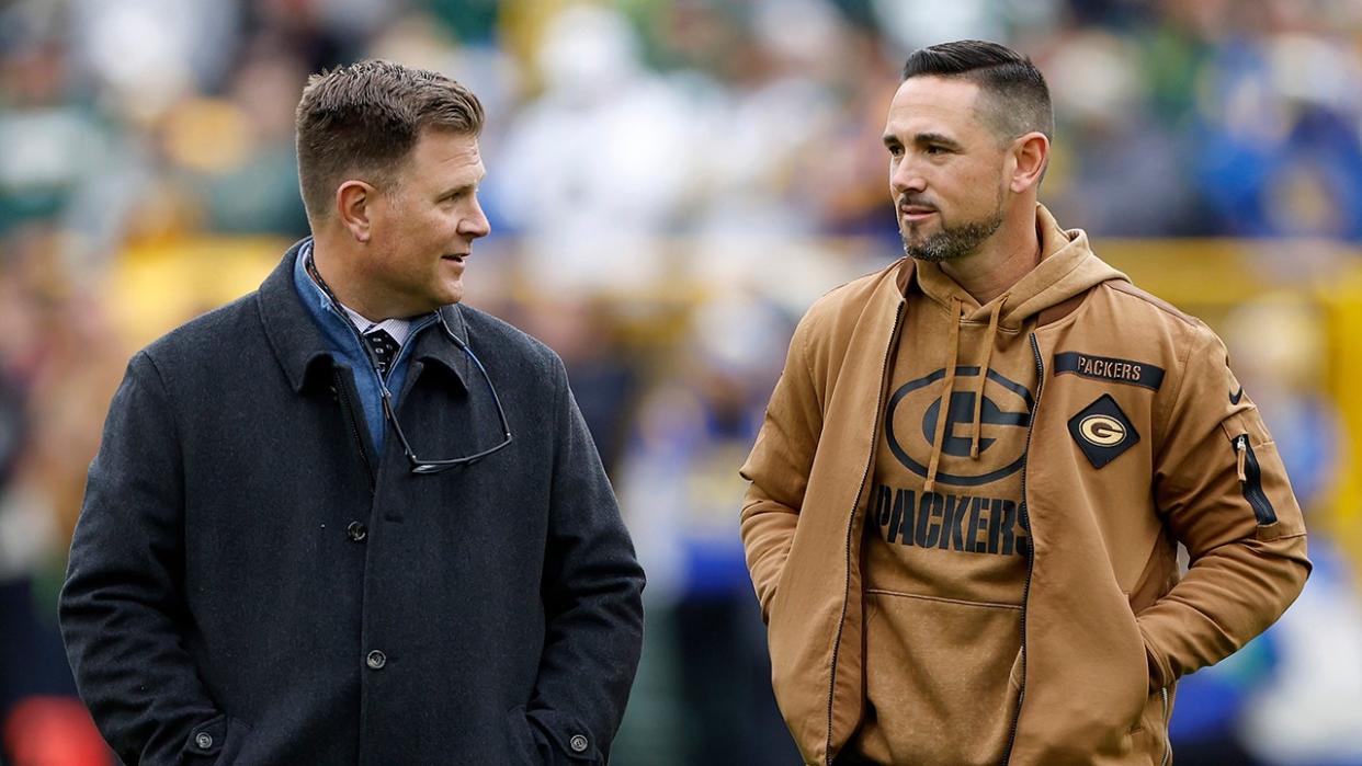 <div>General manager Brian Gutekunst and head coach Matt LaFleur talk before a game against the Los Angeles Rams at Lambeau Field on Nov. 5, 2023. (Photo by John Fisher/Getty Images)</div>