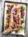 <p>Get the <a href="https://theviewfromgreatisland.com/mediterranean-sheet-pan-salmon-recipe/" rel="nofollow noopener" target="_blank" data-ylk="slk:Mediterranean Salmon;elm:context_link;itc:0;sec:content-canvas" class="link ">Mediterranean Salmon</a> recipe. </p><p>Recipe from <a href="https://theviewfromgreatisland.com/" rel="nofollow noopener" target="_blank" data-ylk="slk:The View From Great Island;elm:context_link;itc:0;sec:content-canvas" class="link ">The View From Great Island</a>. </p>