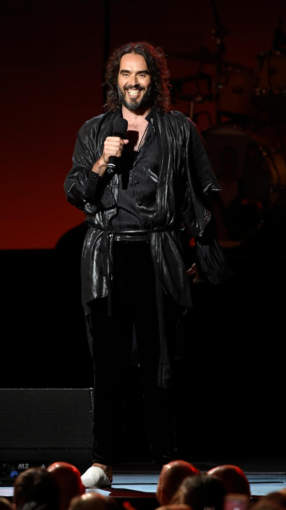 Russell Brand speaks onstage during MusiCares Person of the Year honoring Aerosmith on Jan. 24, 2020, in Los Angeles.