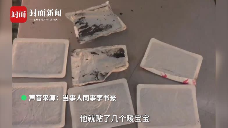 男子的暖暖包破掉，裡面的黑色鐵粉跑出來了。（圖／翻攝自封面視頻）