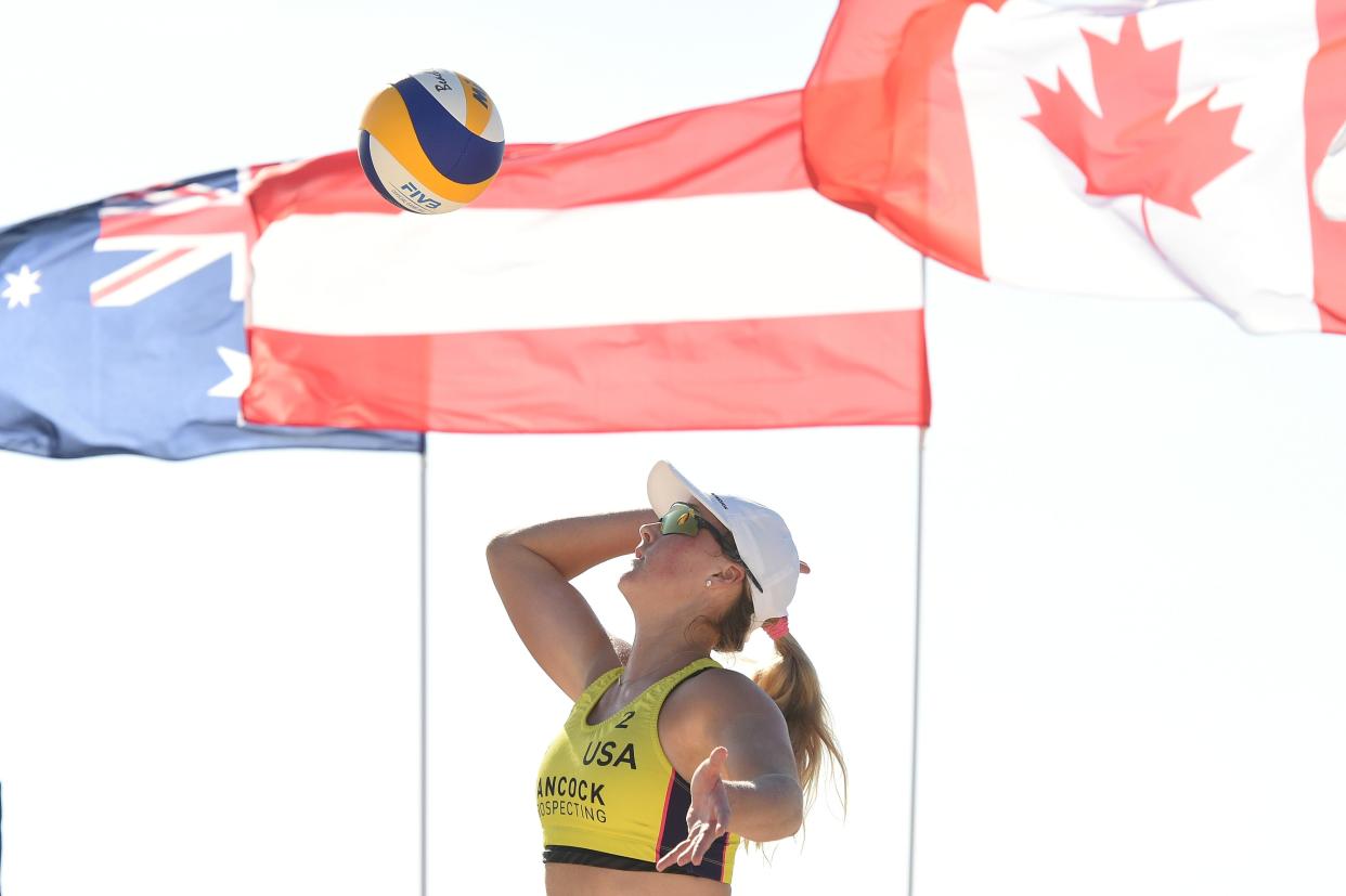 Taryn Kloth serves with Kristen Nuss of USA their gold medal match against Phoebe Bell and Nicole Laird of Australia during the Volleyball World Beach Pro Tour at Coolangatta Beachfront on April 03, 2022 in Gold Coast, Australia.