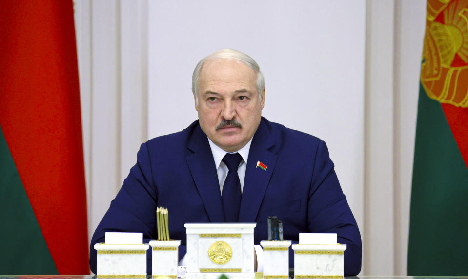 Belarusian President Alexander Lukashenko speaks during a cabinet meeting in Minsk, Belarus, Thursday, Nov. 11, 2021. Lukashenko on Thursday called the Russian bomber flights a necessary response to the tensions on the Belarus-Poland border. (Nikolay Petrov/BelTA Pool Photo via AP)