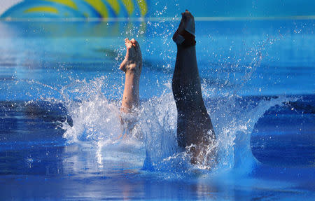 Diving - Gold Coast 2018 Commonwealth Games - Women's Synchronised 3m Springboard - Final - Optus Aquatic Centre - Gold Coast, Australia - April 11, 2018. Esther Qin and Georgia Sheehan of Australia compete. REUTERS/David Gray