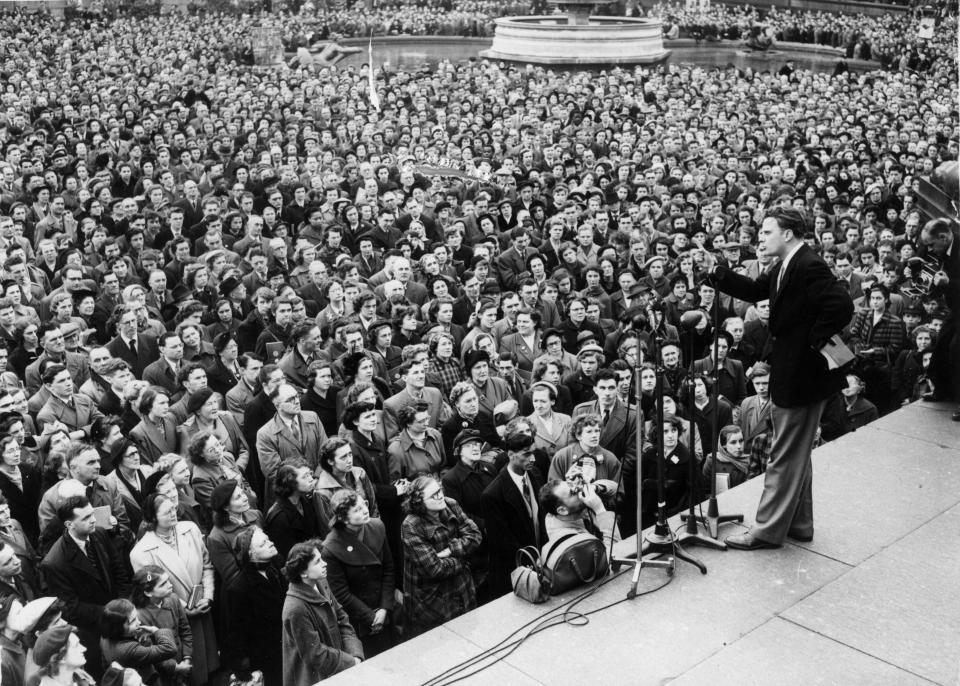 Graham&nbsp;addresses a crowd in Trafalgar Square in London.