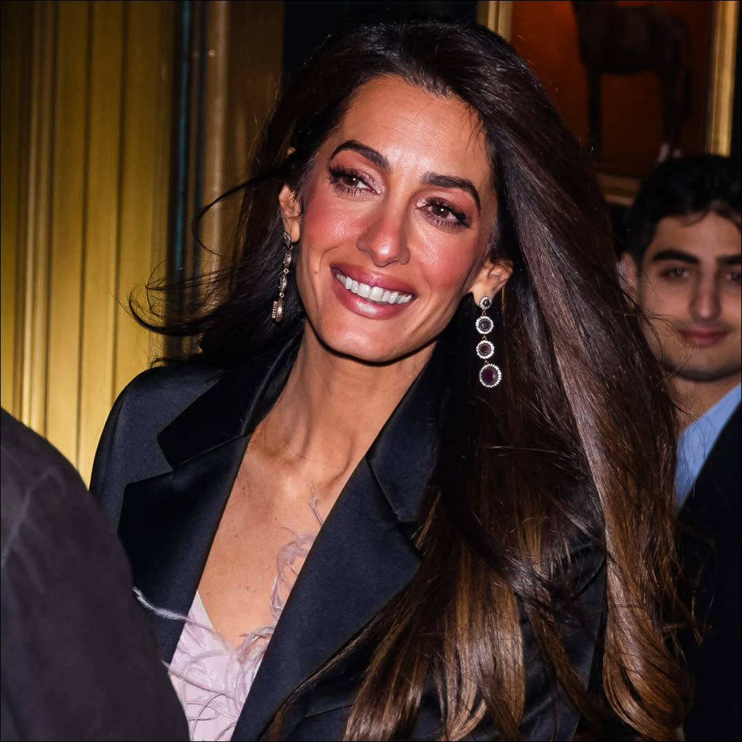  George Clooney and Amal Clooney leave the Polo Bar on December 14, 2023 in New York City. . 