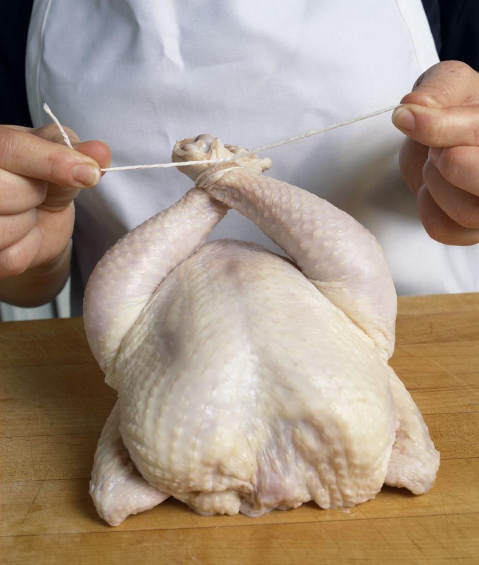 <p>Many people swear by tying the turkey's legs together to make the finished product look neat and tidy, but the technique can actually make it harder to cook the bird through and makes for less crispy surface area on the turkey breast. You're better off skipping this fussy step, which means more time for flavor infusion!</p>