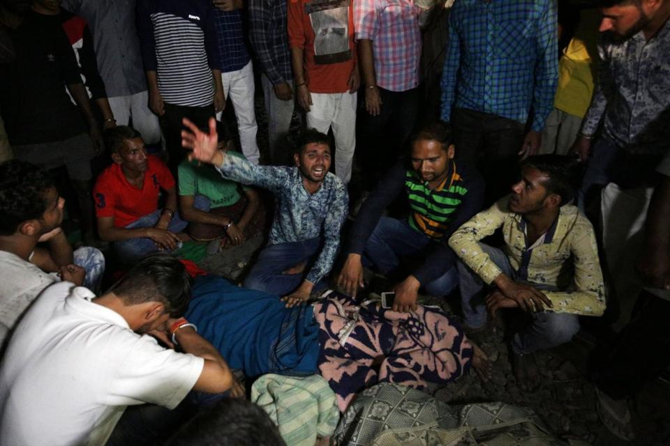 The crowd were watching the burning of Ravana effigy during Dusshera celebrations (EPA)