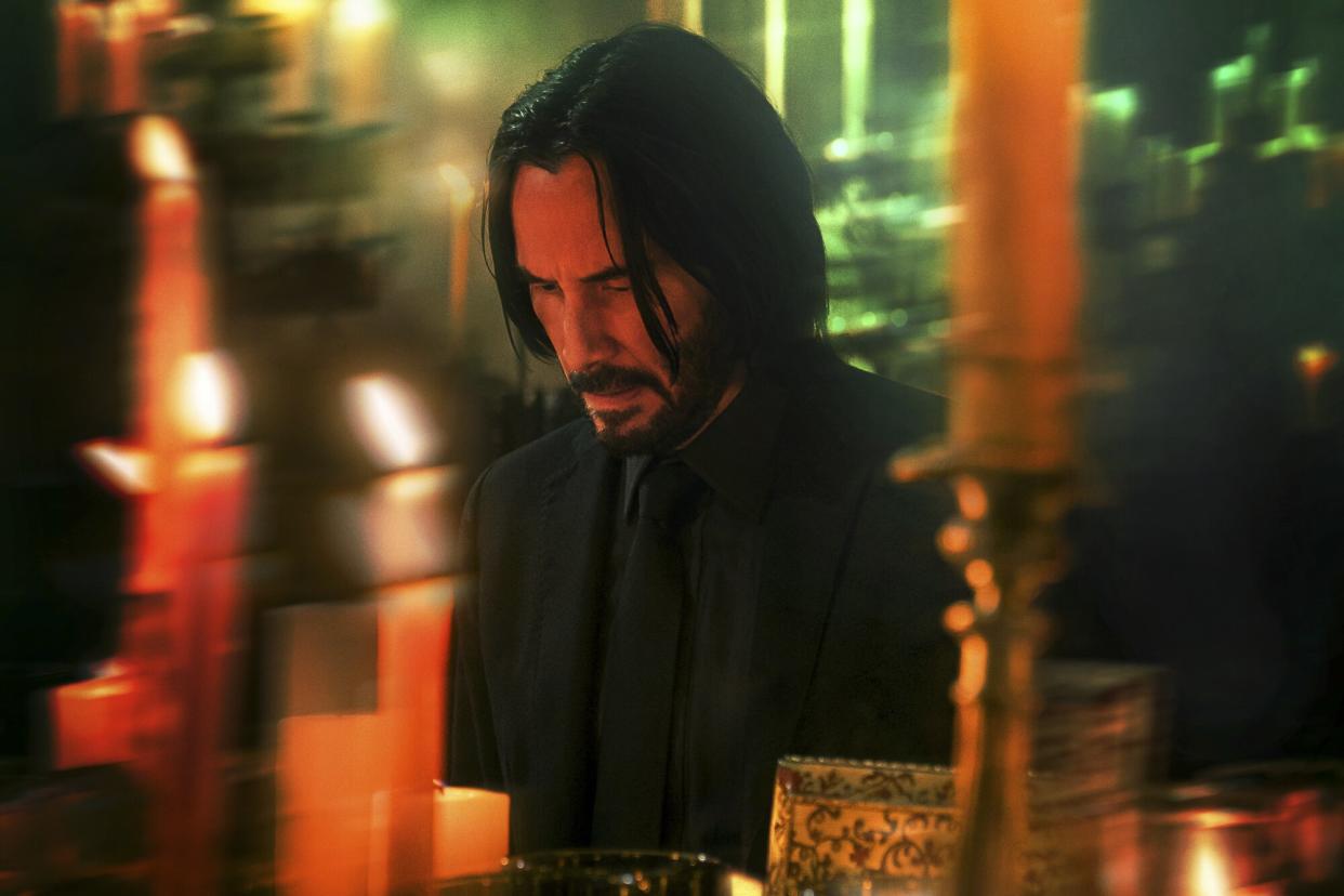 Keanu Reeves as John Wick and Donnie Yen as Caine in John Wick 4