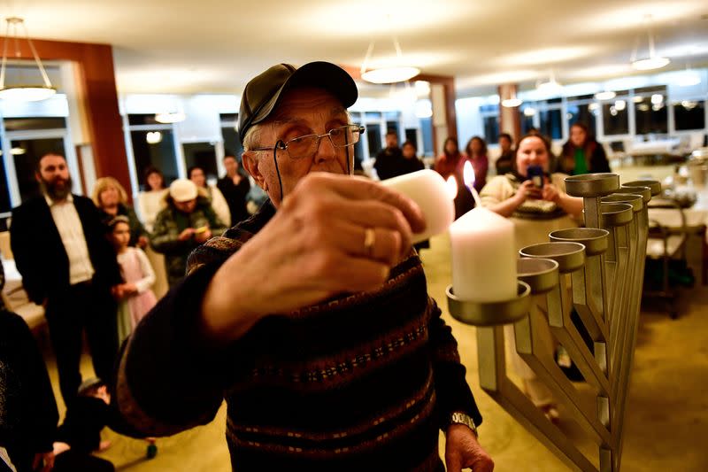 Hasidic Jewish refugees from Ukraine celebrate Hanukkah at a kosher shelter on the banks of Hungary's Lake Balaton