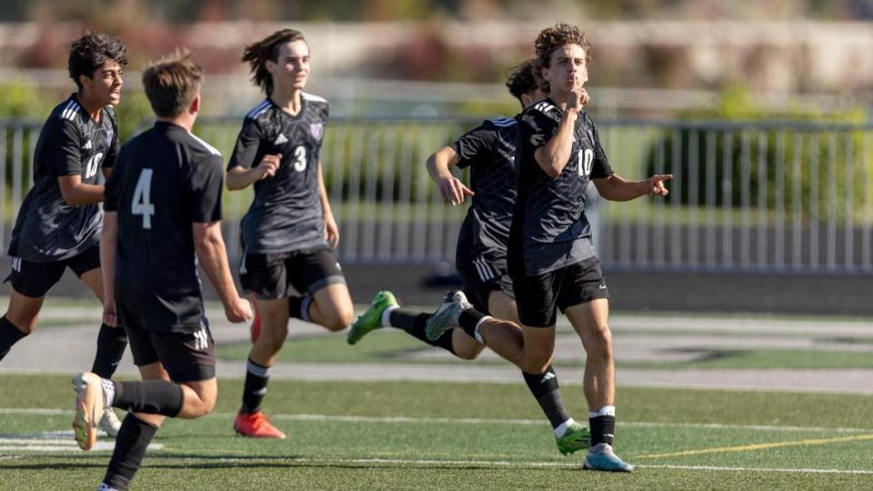 Rocky Mountain’s Rylan McPherson, right, was voted the 5A SIC Player of the Year by the league’s coaches.