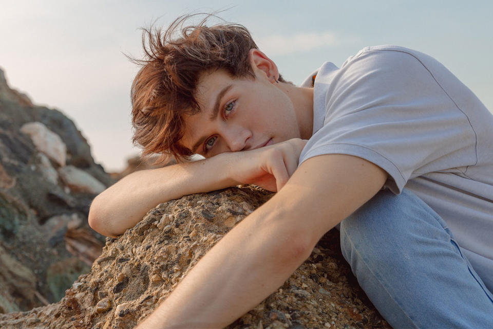 <p>Aidan Alexander is proving he can do it all!</p> <p>The actor-singer-songwriter is making a name for himself in the entertainment industry as a multifaceted storyteller. While the Boise-native first moved to Los Angeles at 15 to star in the film <i>Red Wing, </i>the young star dove into his music career a few years after. </p> <p>The 20-year-old released his first single,<a href="https://protect-us.mimecast.com/s/5xYSCrkpkVTAm46rqc7yzeK?domain=youtube.com" rel="nofollow noopener" target="_blank" data-ylk="slk:“I Don’t Love You,”;elm:context_link;itc:0;sec:content-canvas" class="link "> “I Don’t Love You,”</a> in 2018 which garnered praise from PAPER and <em>Billboard</em>, and the songwriter continues to show off his lyricism in his recent track <a href="https://protect-us.mimecast.com/s/WXsaCv2w2LsWlr4E9IXb3p0?domain=open.spotify.com" rel="nofollow noopener" target="_blank" data-ylk="slk:“The End of The World,”;elm:context_link;itc:0;sec:content-canvas" class="link ">“The End of The World,”</a> a song inspired by the isolation of quarantine. </p> <p>The performer is continuing to share music in 2021 with the release of his newest song <a href="https://www.youtube.com/watch?v=letVO6poUaI" rel="nofollow noopener" target="_blank" data-ylk="slk:“The Hills;elm:context_link;itc:0;sec:content-canvas" class="link ">“The Hills</a>,” which Alexander shares is about some of the things he’s witnessed while living in LA. </p> <p>“To me, it’s highlighting this dark underside of the industry where people do corrupt things to climb the ladder,” Alexander tells PEOPLE. “Growing up in LA, you see and hear a lot, so I wanted to write something dark yet still playful about those things.”</p> <p>Be on the lookout for more from Alexander this year as he plans to release another track in April and his debut EP in May.</p>