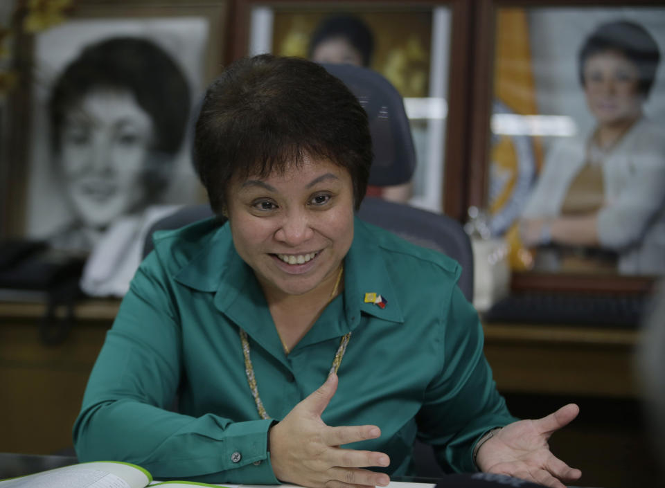 In this Feb. 4, 2014 photo, Bureau of Internal Revenue Commissioner Kim Henares speaks during an interview at her office at suburban Quezon city, northeast of Manila, Philippines. The petite sharp-shooting bureaucrat in charge of getting Filipinos to pay their fair share of taxes couldn’t have chosen a higher profile target: Manny Pacquiao, the world champion boxer and hero to millions. Henares has remained steadfast in her campaign against the boxer, who also was listed as the country’s wealthiest member of Congress last year. The Philippines posted 7.2 percent growth in gross domestic product last year, the second highest in Asia after China, but government revenue has fallen short of expectations in a country where decades of corrupt and inefficient government allowed a culture of tax evasion to flourish. (AP Photo/Bullit Marquez)