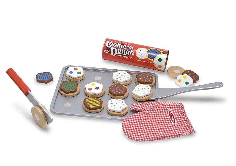 This product image released by Melissa & Doug shows the Melissa & Doug Slice and Bake Wooden Cookie Play Food Set. (Melissa & Doug via AP)