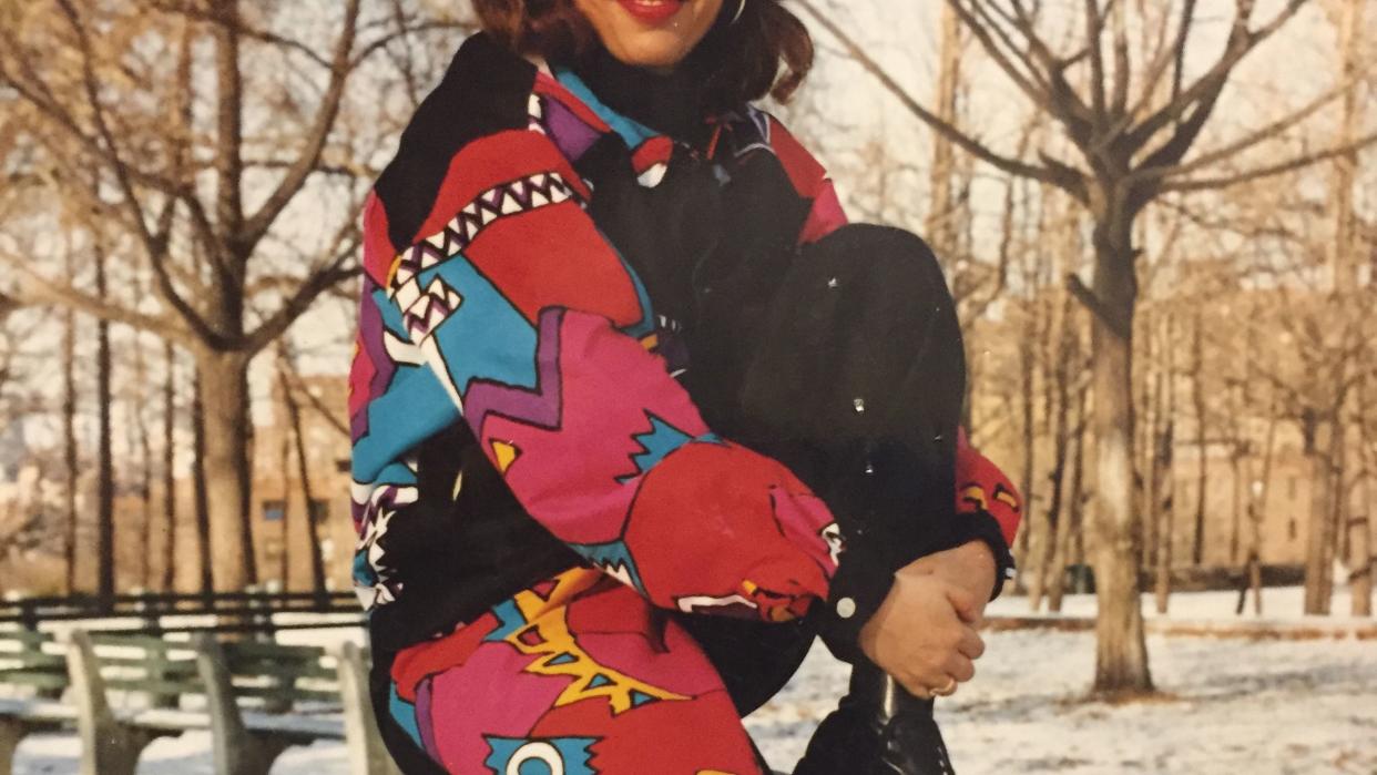 a person holding a snowboard