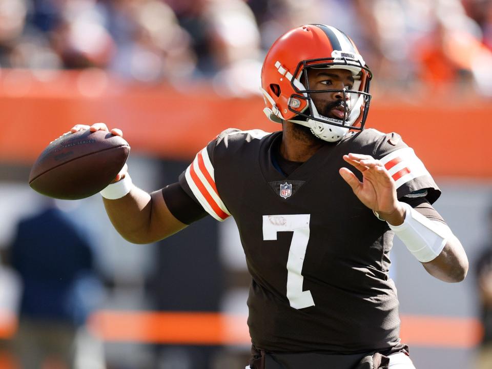 Jacoby Brissett looks to pass against the New England Patriots.