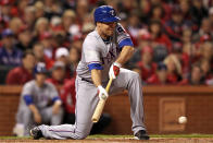 ST LOUIS, MO - OCTOBER 27: Colby Lewis #48 of the Texas Rangers bunts into a double play in the second inning during Game Six of the MLB World Series against the St. Louis Cardinals at Busch Stadium on October 27, 2011 in St Louis, Missouri. (Photo by Jamie Squire/Getty Images)