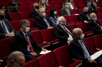 DELETES REFERENCE TO LAW ENFORCEMENT OFFICIALS - Attendees sit apart while listening to U.S. Attorney General William Barr speak at the Gerald R. Ford Presidential Museum in Grand Rapids, Mich., Thursday, July 16, 2020. (Nicole Hester/Mlive.com/Ann Arbor News via AP)