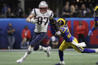 FILE - In this Feb. 3, 2019, file photo, New England Patriots' Rob Gronkowski (87) runs against Los Angeles Rams' Nickell Robey-Coleman (23) during the first half of the NFL Super Bowl 53 football game in Atlanta. Gronkowski says he is retiring from the NFL after nine seasons. Gronkowski announced his decision via a post on Instagram Sunday, March 24, 2019, saying that a few months shy of this 30th birthday “its time to move forward and move forward with a big smile.” (AP Photo/Jeff Roberson, File)