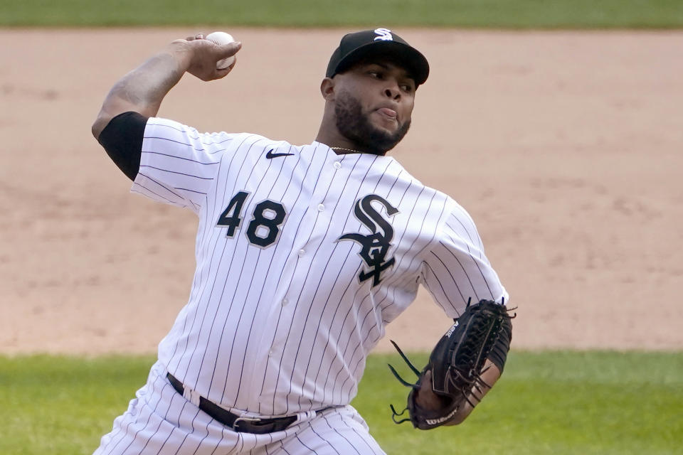 FILE - Chicago White Sox relief pitcher Alex Colomé delivers during the ninth inning of a baseball game against the Minnesota Twins in Chicago, in this Sept. 17, 2020, file photo. The Minnesota Twins signed Alex Colomé away from their chief divisional competition, the Chicago White Sox, to bring in a proven closer to the back of the bullpen. The Twins won't formally assign that role, though, with Taylor Rogers, Hansel Robles and Tyler Duffey all in position for ninth-inning outs.(AP Photo/Charles Rex Arbogast, File)