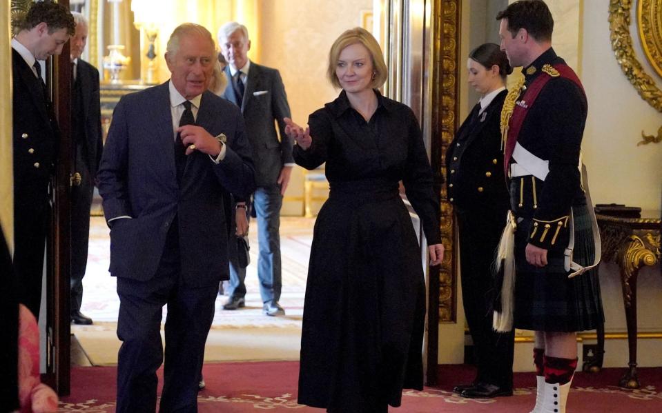 Liz Truss and King Charles - AFP