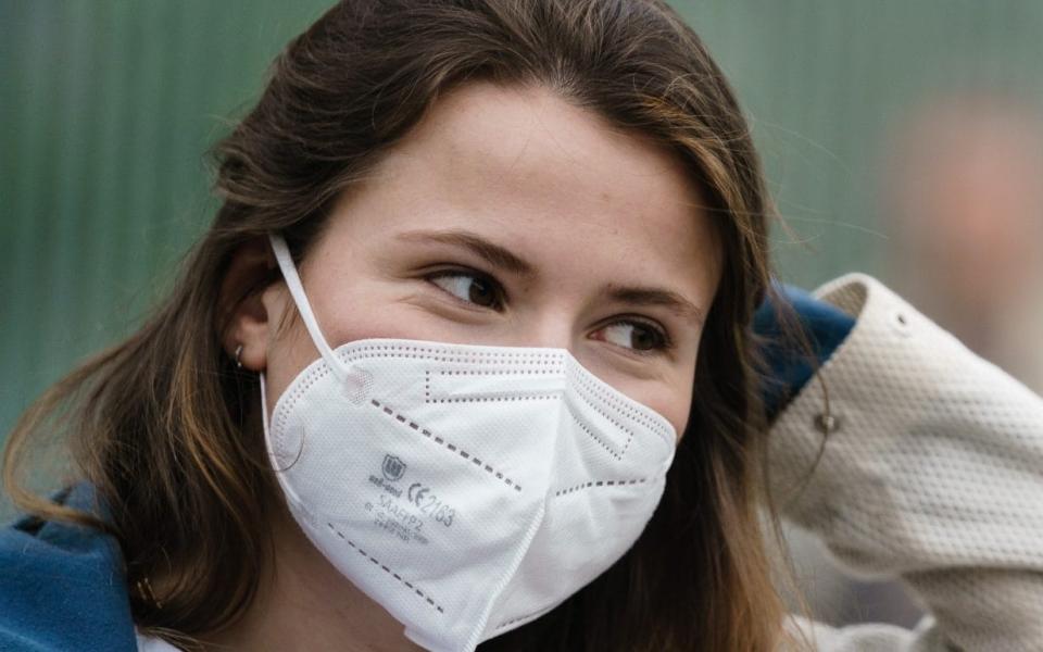 Mandatory Credit: Photo by CLEMENS BILAN/EPA-EFE/Shutterstock (11900676m) Climate activist of Fridays for Future Luisa Neubauer wears a face mask as she stands next to an activist wearing a panda costume in front of the Chancellery during a protest in Berlin, Germany, 12 May 2021. The activists protest as German ministers met earlier the day in the cabinet meeting to adjust the climate law following the ruling by the Federal Constitutional Court. Fridays for Future protest in front of Chancellery in Berlin, Germany - 12 May 2021 - CLEMENS BILAN/Shutterstock