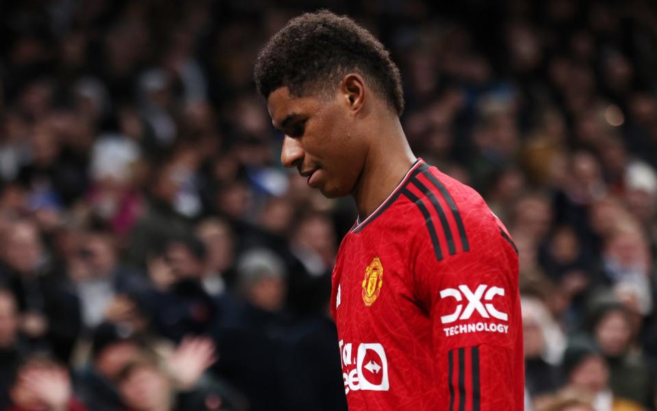 Marcus Rashford of Manchester United looks dejected after being shown a red card during the Champions League match with Copenhagen