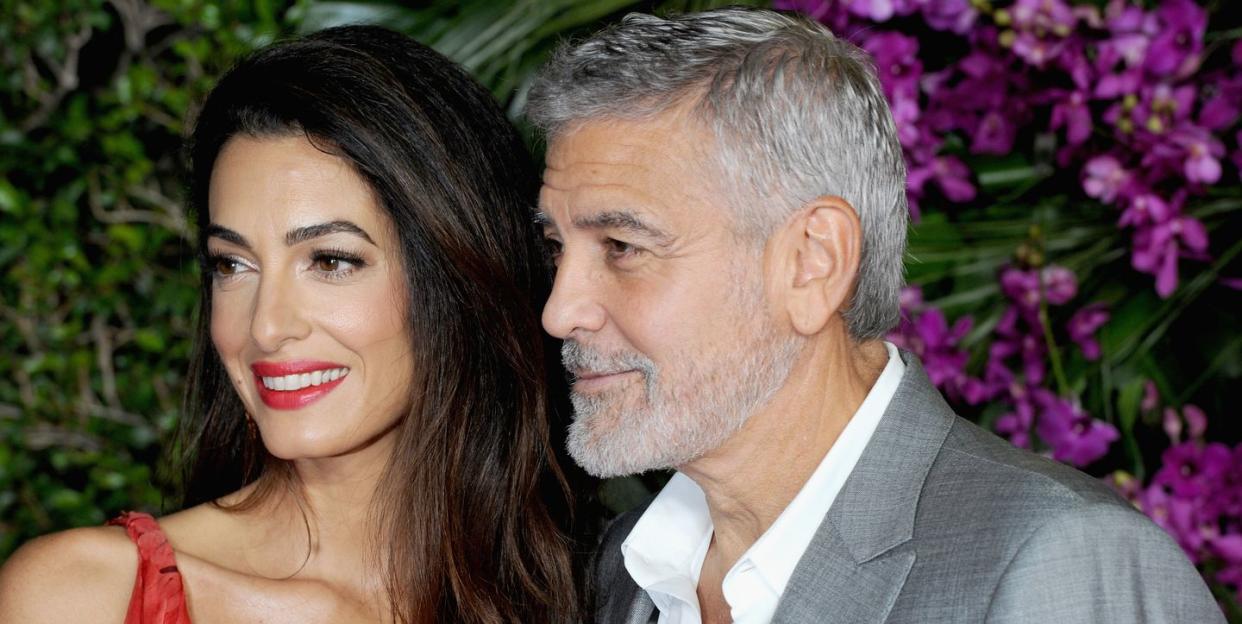 amal and george clooney at the premiere of universal pictures' 