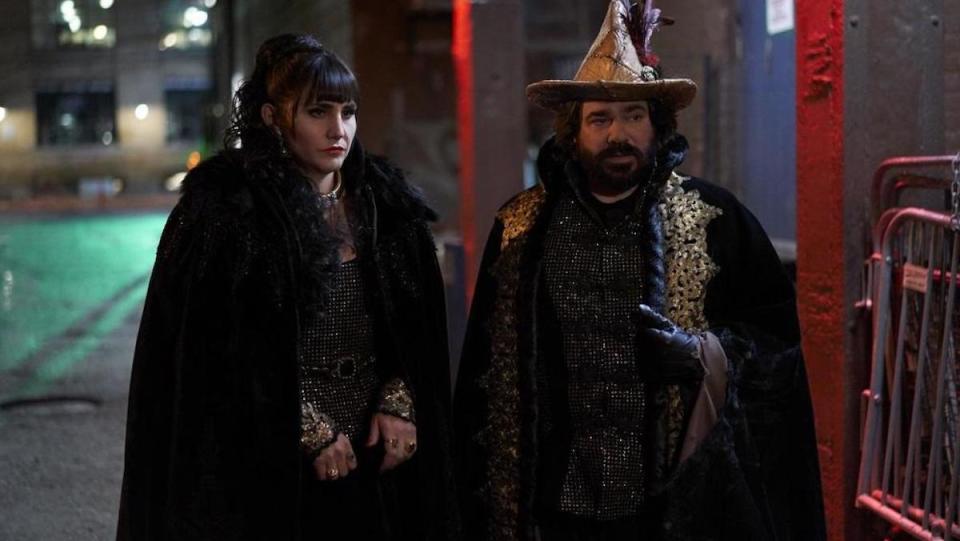 Nadja and Laszlo, in a witch's hat, in What We Do In the Shadows.