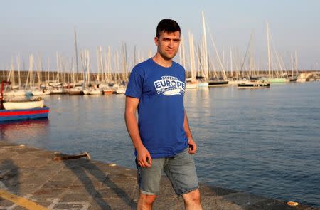 Martin Sellner, spokesman for Identitarian movement in Austria, poses in the harbour of Catania, Italy, July 19, 2017. REUTERS/Antonio Parrinello