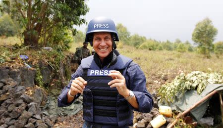 Al Jazeera journalist Peter Greste poses for a photograph in Kibati village, near Goma in the eastern Democratic Republic of Congo August 7, 2013. REUTERS/Thomas Mukoya