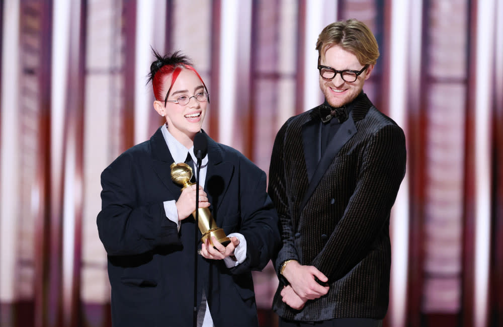 Billie Eilish and Finneas O'Connell accept their Golden Globe Award credit:Bang Showbiz