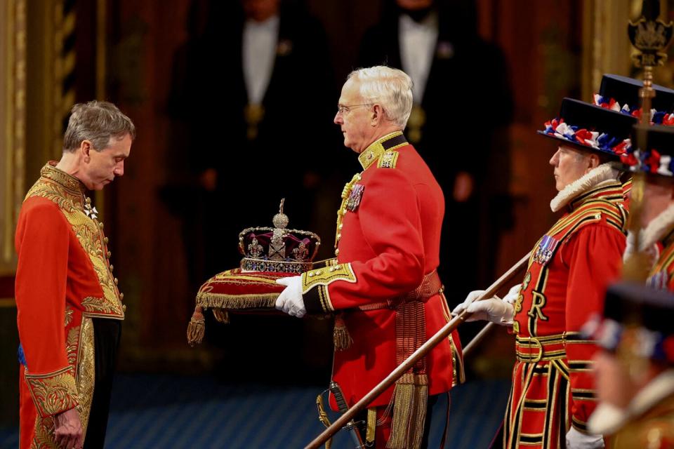 The Imperial State Crown arrives at the Royal Gallery before the State Opening of Parliament in the House of Lords, at the Palace of Westminster